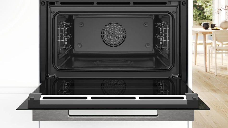 Духовой шкаф Bosch электрический компактный, 47л, A+, пар, дисплей, конвекция, черный CSG7364B1 фото